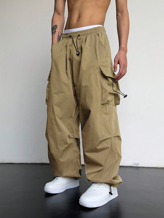 Manfinity EMRG Men Solid Flap Pocket Drawstring Waist Oversized Cargo Baggy Pants, Back to School